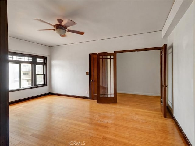 1030 E Ocean Blvd Unit 403, Long Beach, CA 90802 - spare room featuring light wood-type flooring, ceiling fan, and baseboards