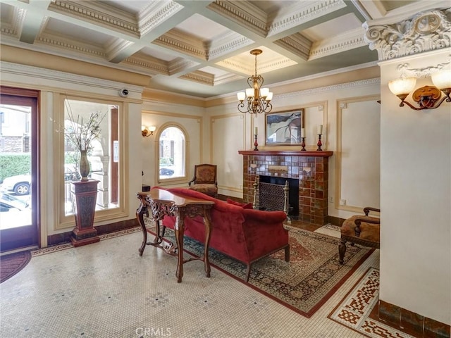 1030 E Ocean Blvd Unit 403, Long Beach, CA 90802 - living room featuring a chandelier, coffered ceiling, crown molding, beam ceiling, and a tiled fireplace
