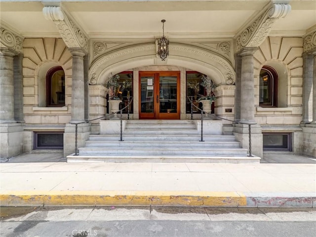 1030 E Ocean Blvd Unit 403, Long Beach, CA 90802 - property entrance with stone siding, french doors, and covered porch