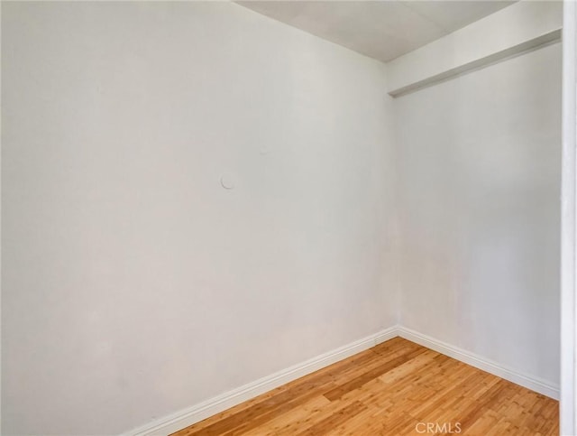 1030 E Ocean Blvd Unit 403, Long Beach, CA 90802 - empty room featuring light wood-style floors and baseboards