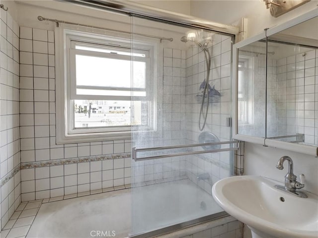 1030 E Ocean Blvd Unit 403, Long Beach, CA 90802 - bathroom with a sink and bath / shower combo with glass door