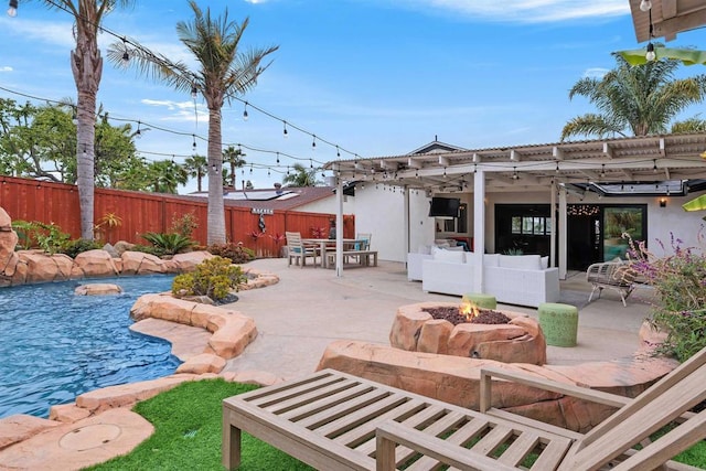 3984 Scott Dr, Carlsbad, CA 92008 - view of swimming pool with a patio area, an outdoor living space with a fire pit, a fenced backyard, and outdoor dining area
