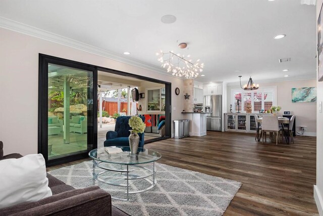 3984 Scott Dr, Carlsbad, CA 92008 - living room with a chandelier, ornamental molding, dark wood-type flooring, baseboards, and recessed lighting