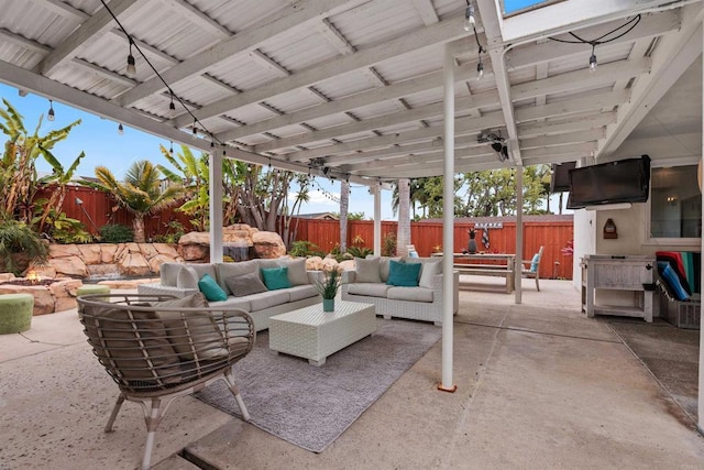 3984 Scott Dr, Carlsbad, CA 92008 - fenced backyard featuring a patio and an outdoor living space with a fire pit
