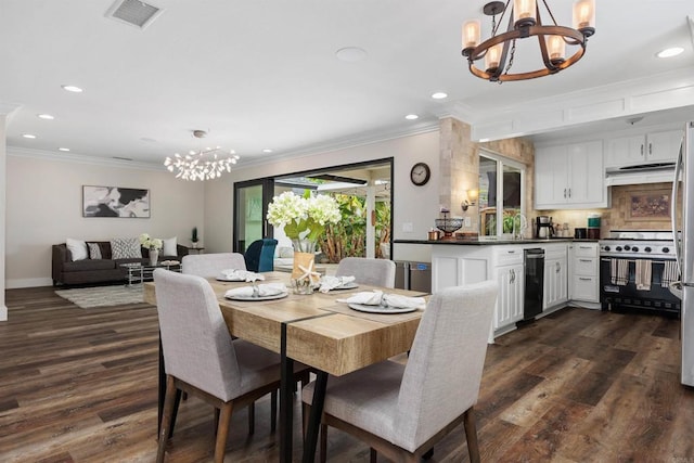 3984 Scott Dr, Carlsbad, CA 92008 - dining space featuring a chandelier, crown molding, recessed lighting, dark wood-style floors, and baseboards