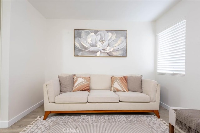 3720 S St Andrews Pl, Los Angeles, CA 90018 - sitting room with wood finished floors and baseboards