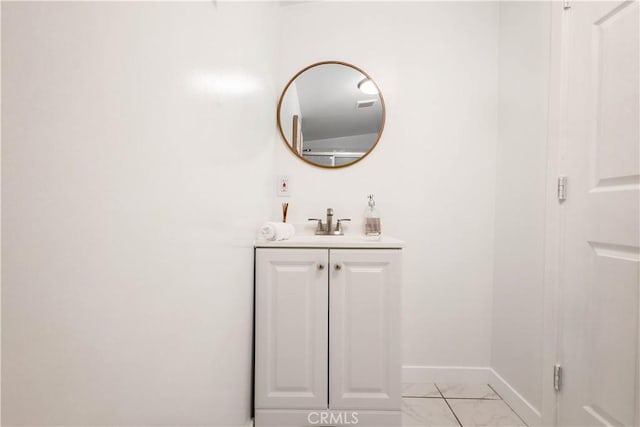 3720 S St Andrews Pl, Los Angeles, CA 90018 - bathroom featuring marble look tiles and vanity