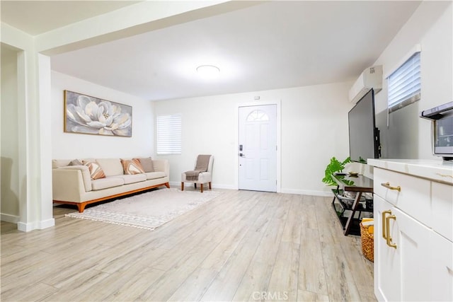 3720 S St Andrews Pl, Los Angeles, CA 90018 - living area featuring light wood-style flooring and baseboards
