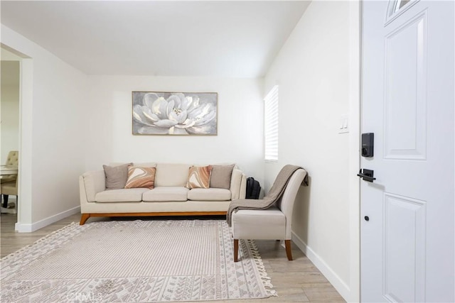3720 S St Andrews Pl, Los Angeles, CA 90018 - living area featuring light wood-style floors and baseboards
