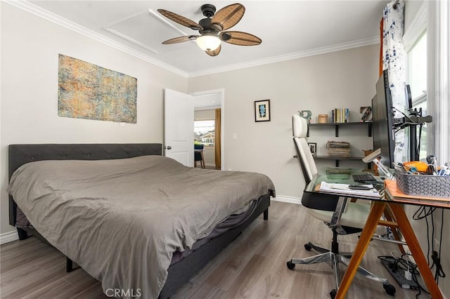3648 4th Ave, Los Angeles, CA 90018 - bedroom featuring crown molding, wood finished floors, a desk, and a ceiling fan