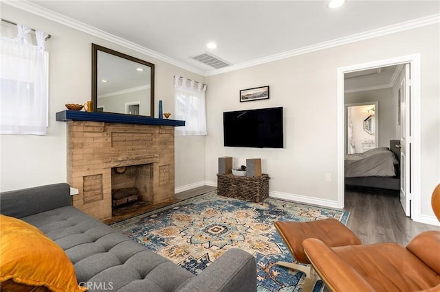 3648 4th Ave, Los Angeles, CA 90018 - living area featuring wood finished floors, recessed lighting, ornamental molding, and a fireplace
