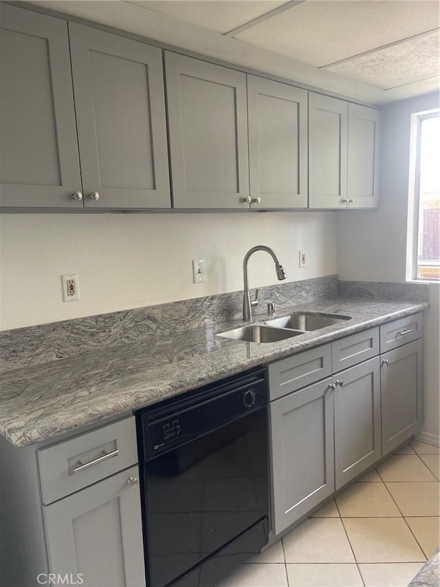8505 Columbus Ave Unit 316, North Hills, CA 91343 - kitchen featuring black dishwasher, a sink, gray cabinetry, and light tile patterned floors