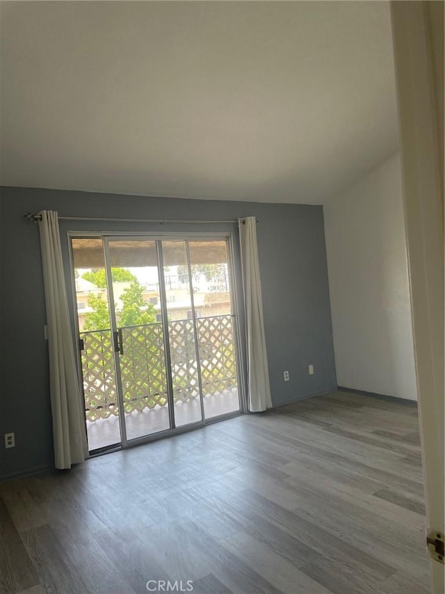 8505 Columbus Ave Unit 316, North Hills, CA 91343 - unfurnished room featuring wood finished floors