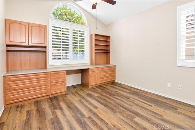 730 Zaphiro Ct, San Jacinto, CA 92583 - unfurnished office with built in study area, ceiling fan, vaulted ceiling, dark wood finished floors, and baseboards