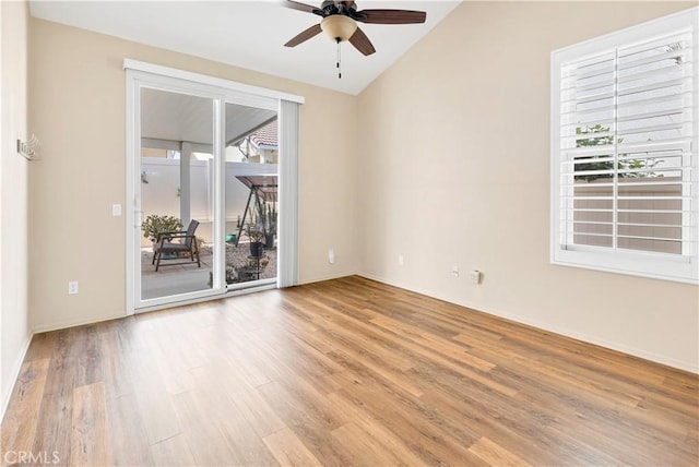 730 Zaphiro Ct, San Jacinto, CA 92583 - empty room featuring light wood-style flooring, a ceiling fan, vaulted ceiling, and baseboards