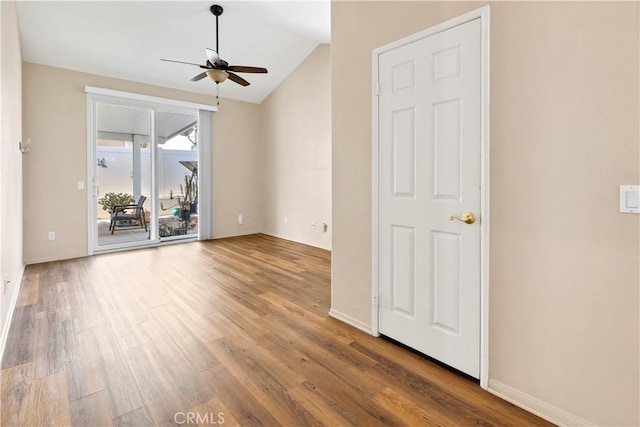 730 Zaphiro Ct, San Jacinto, CA 92583 - spare room with ceiling fan, wood finished floors, lofted ceiling, and baseboards