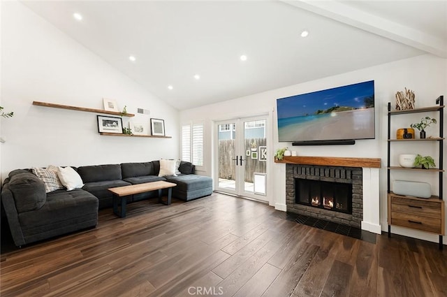 2191 Canyon Unit C103, Costa Mesa, CA 92627 - living room with wood finished floors, high vaulted ceiling, a fireplace, recessed lighting, and beam ceiling
