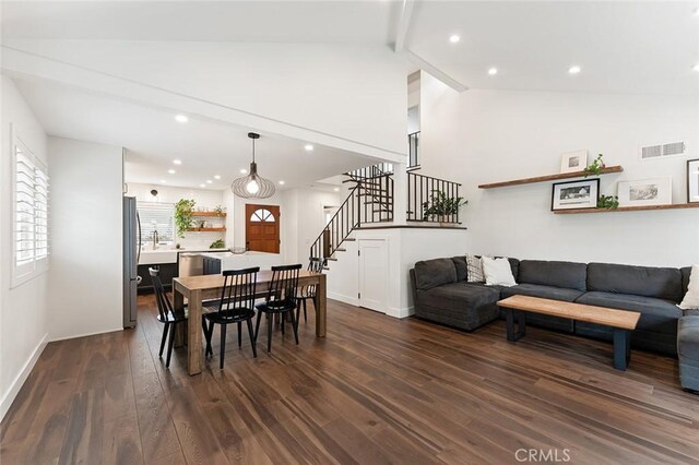 2191 Canyon Unit C103, Costa Mesa, CA 92627 - dining area featuring dark wood-type flooring, stairs, recessed lighting, baseboards, and beamed ceiling