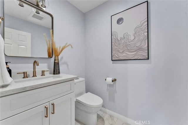 11376 Starlight Dr, Rancho Cucamonga, CA 91701 - bathroom featuring marble look tile flooring and vanity