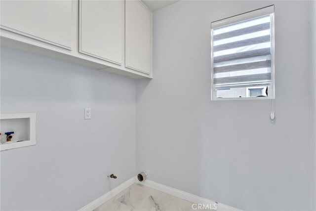 11376 Starlight Dr, Rancho Cucamonga, CA 91701 - washroom with washer hookup, gas dryer hookup, cabinet space, and marble finish floors