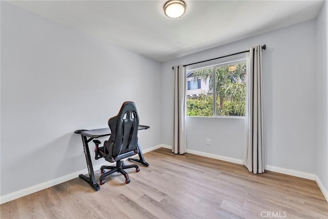 11376 Starlight Dr, Rancho Cucamonga, CA 91701 - home office featuring light wood-style floors
