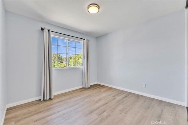 11376 Starlight Dr, Rancho Cucamonga, CA 91701 - unfurnished room with light wood finished floors and baseboards
