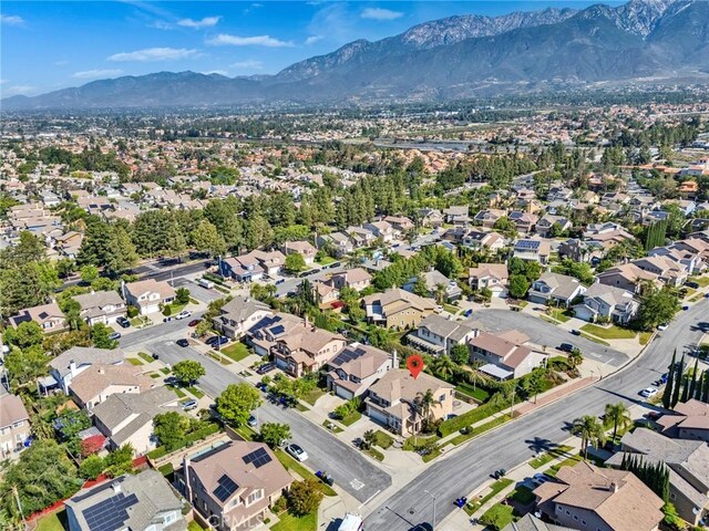 11376 Starlight Dr, Rancho Cucamonga, CA 91701 - aerial view of property's location featuring a mountain backdrop and nearby suburban area