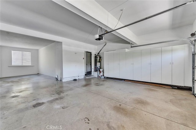 11376 Starlight Dr, Rancho Cucamonga, CA 91701 - garage with a garage door opener and secured water heater