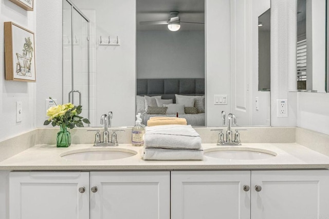 1003 Overton Ct, Tustin, CA 92780 - ensuite bathroom featuring double vanity, a shower with shower door, and ceiling fan