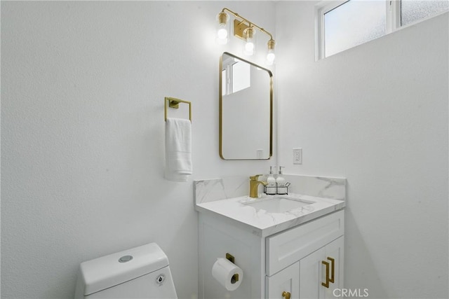 1217 W 77th St, Los Angeles, CA 90044 - bathroom featuring vanity and toilet
