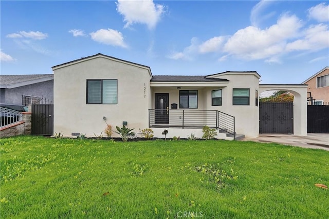 1217 W 77th St, Los Angeles, CA 90044 - view of front of property with stucco siding, a porch, and a carport