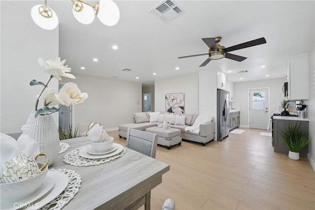 1217 W 77th St, Los Angeles, CA 90044 - dining room with a ceiling fan, light wood-style floors, recessed lighting, and baseboards