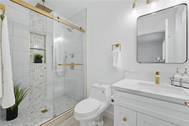 1217 W 77th St, Los Angeles, CA 90044 - bathroom featuring vanity, a shower stall, and toilet