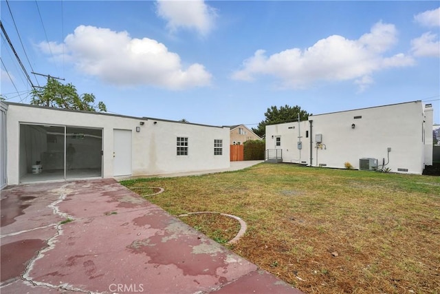 1217 W 77th St, Los Angeles, CA 90044 - view of yard with a patio area, driveway, an attached garage, and cooling unit