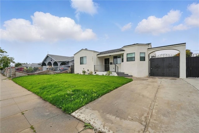 1217 W 77th St, Los Angeles, CA 90044 - view of front facade featuring stucco siding, concrete driveway, and a gate