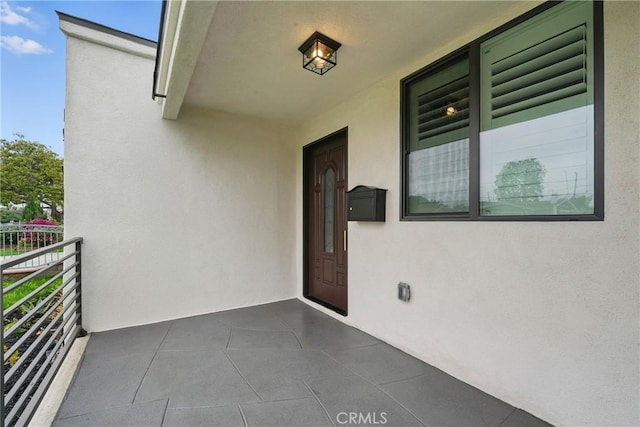 1217 W 77th St, Los Angeles, CA 90044 - property entrance featuring stucco siding