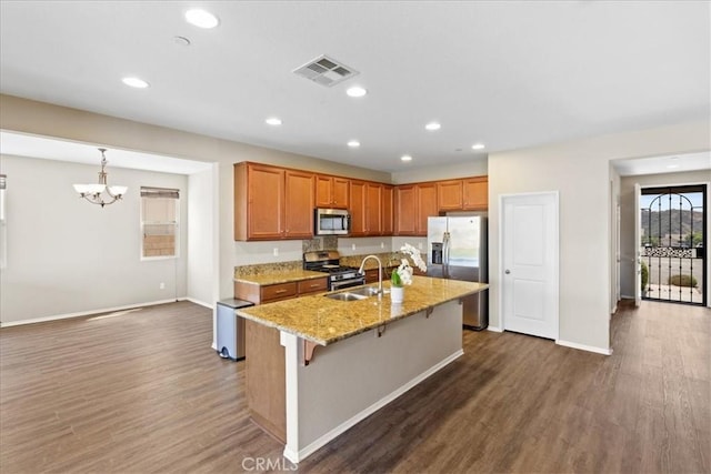 1472 Coyote Ln, Calimesa, CA 92320 - kitchen with appliances with stainless steel finishes, a chandelier, dark wood-type flooring, baseboards, and a sink