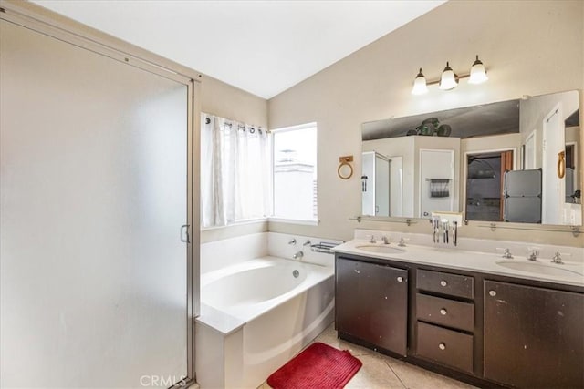 507 Coudures Way, Perris, CA 92571 - bathroom with a bath, double vanity, lofted ceiling, a shower stall, and tile patterned flooring