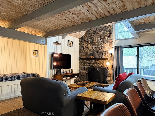 41935 Switzerland Dr Unit 113, Big Bear Lake, CA 92315 - living room with wood finished floors, wooden ceiling, and a stone fireplace