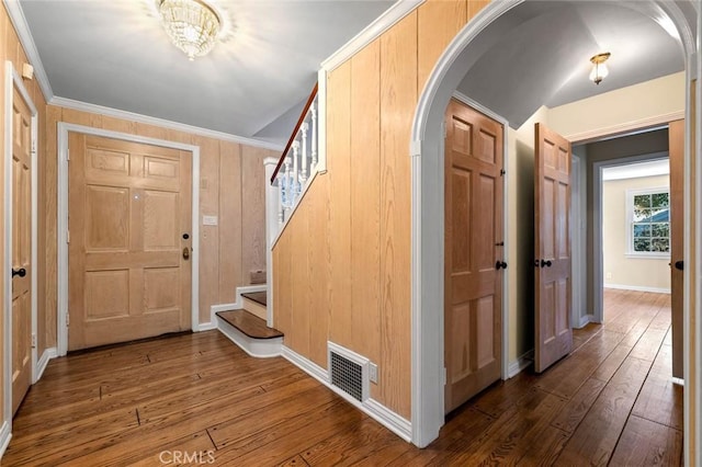 15454 Sutton St, Sherman Oaks, CA 91403 - entryway with arched walkways, stairs, hardwood / wood-style flooring, baseboards, and ornamental molding