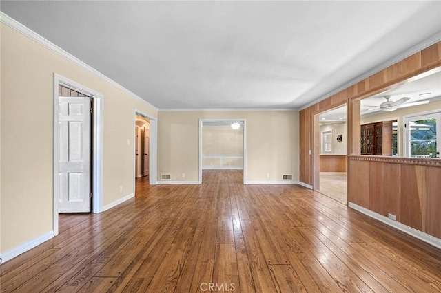 15454 Sutton St, Sherman Oaks, CA 91403 - unfurnished living room with hardwood / wood-style floors, crown molding, a ceiling fan, and baseboards
