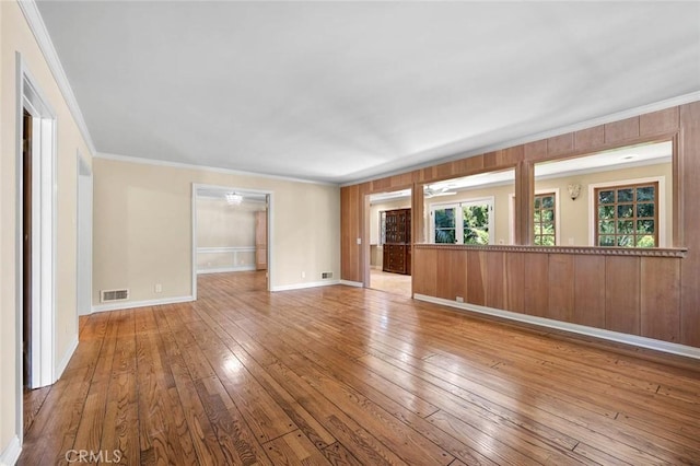 15454 Sutton St, Sherman Oaks, CA 91403 - unfurnished living room with hardwood / wood-style flooring, crown molding, and baseboards