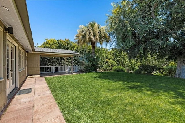 15454 Sutton St, Sherman Oaks, CA 91403 - view of green lawn with a patio area