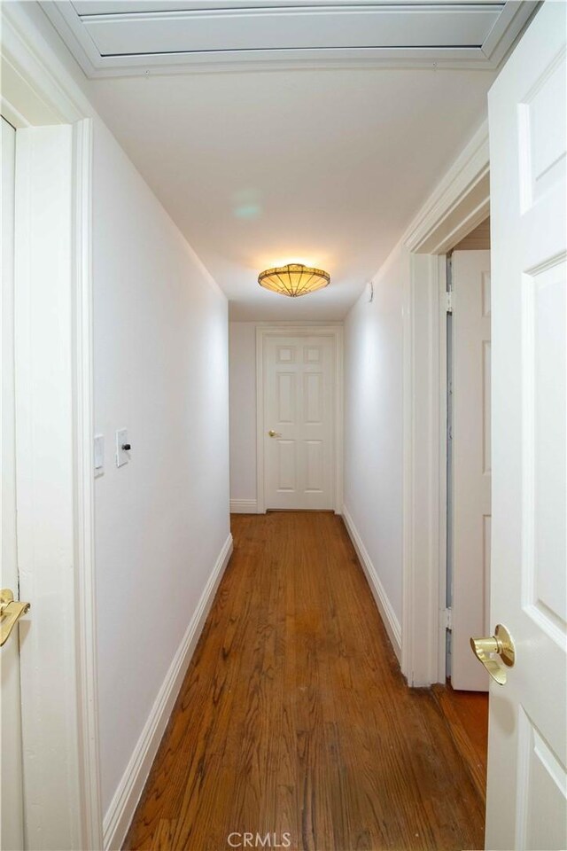 10425 Hillview Ave, Chatsworth, CA 91311 - corridor with wood finished floors and baseboards