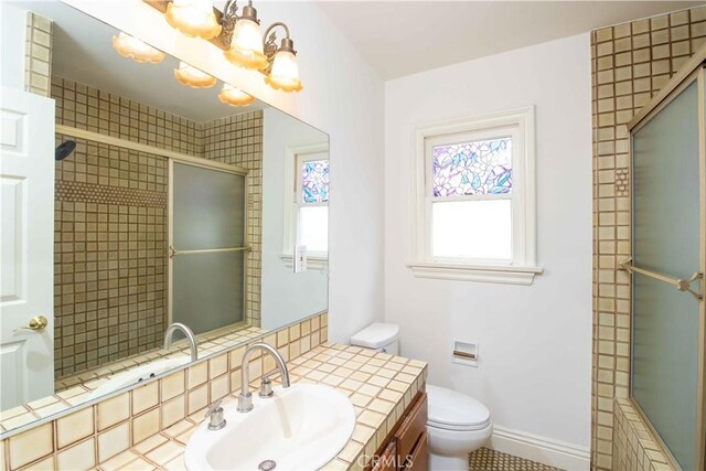 10425 Hillview Ave, Chatsworth, CA 91311 - full bath with toilet, a tile shower, and vanity