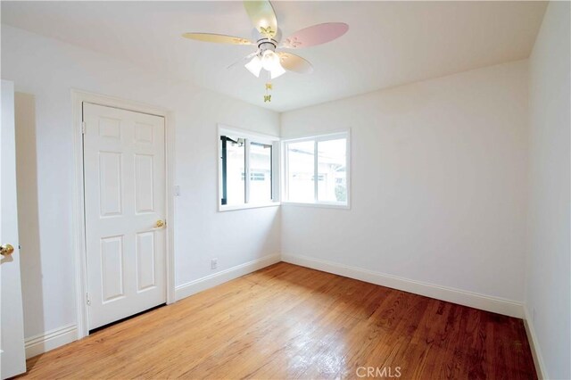 10425 Hillview Ave, Chatsworth, CA 91311 - empty room with ceiling fan, baseboards, and light wood-style flooring