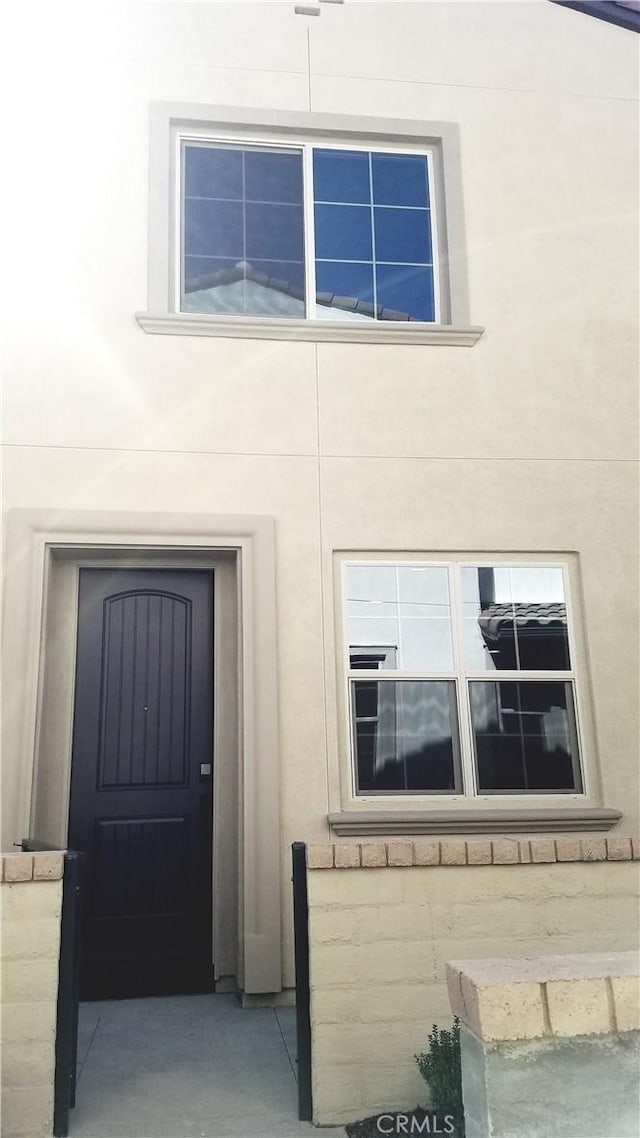 163 Lantana Dr, Stanton, CA 90680 - property entrance featuring stucco siding
