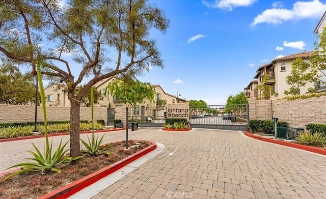163 Lantana Dr, Stanton, CA 90680 - view of home's community with a gate and a residential view