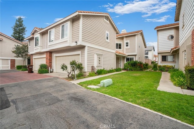2131 Dublin Ln Unit 3, Diamond Bar, CA 91765 - view of property with a front lawn and an attached garage