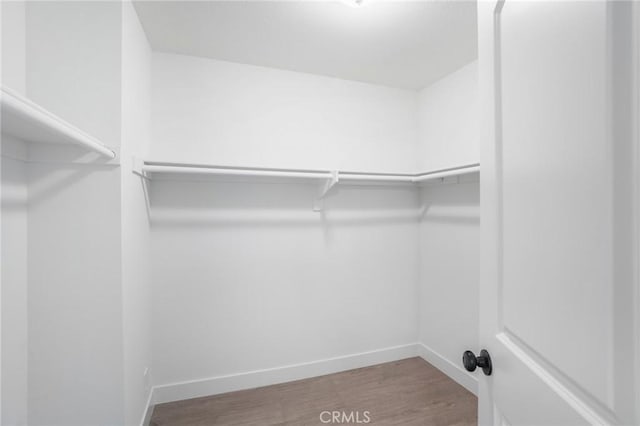 2131 Dublin Ln Unit 3, Diamond Bar, CA 91765 - walk in closet featuring wood finished floors
